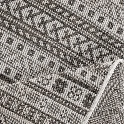 Andiamo In-/Outdoorteppich Saint Jordi - Kunstfaser - Grau / Schwarz 19 Andiamo In-/Outdoorteppich Saint Jordi - Kunstfaser - Grau / Schwarz -Teppiche populaire boutique 1000121227 220203 1521070070 DETAILS P000000001000121227