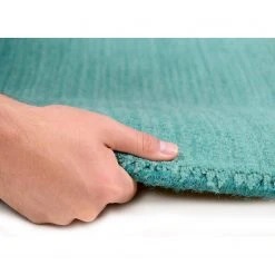 THEKO die markenteppiche Wollteppich Wool Star - Schurwolle - Türkis - 140 x 200 cm -Teppiche populaire boutique 1000249683 210318 08412600155 DETAILS P000000001000249683