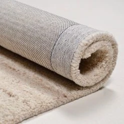 THEKO die markenteppiche Wollteppich Royal Berber II - Schurwolle - Beige - 140 x 200 cm -Teppiche populaire boutique 1000301511 211117 17433703010 DETAILS P000000001000301511